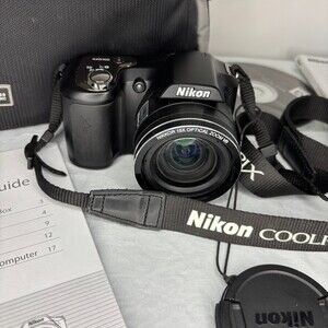 NIKON CoolPix L100 Camera with Bag Lens Cap Lanyard Book Wires